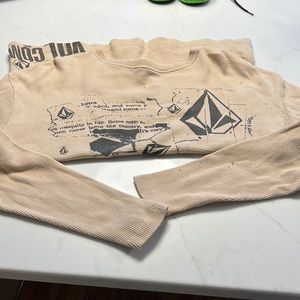 Volcom light weight thermal shirt - size Small. Graphic on front and on btm back